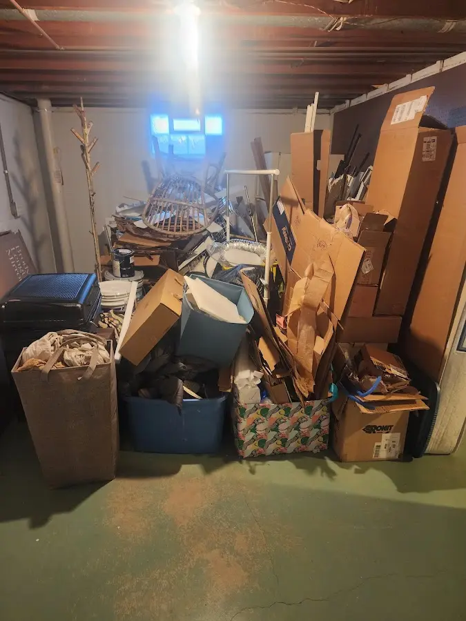 Roll-off dumpster container at job site for 8 Yard Dumpster Rental in Maple Valley